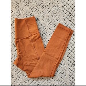 Athleta Salutation Stash 7/8 Tights